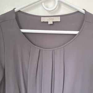 Grey fluid shirt with front pleats by Loft. Size S.